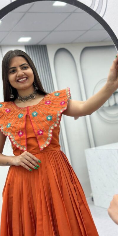 PC 571 Orange Roman Silk Gown with Mirror Work & Embroidery Work. Special Price ₹2099. Delivery 4-6 Working Days. Shop now. | Gowns, Bollywood Gowns, Creative Gowns, Designer Gowns, Embroidered Gowns, Party Wear Gowns