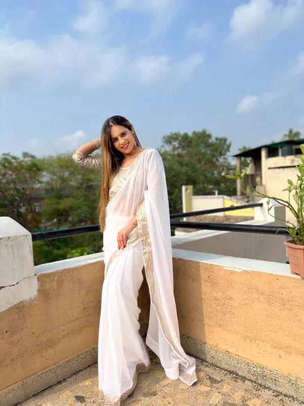 Glamorous White Color Georgette Heavy Sequence Work Saree