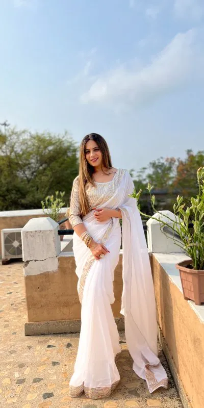 Glamorous White Color Georgette Heavy Sequence Work Saree