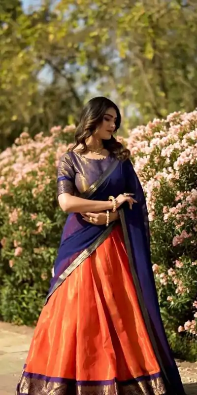 Peaceful Orange Color Kanchipuram Zari Weaving Lehenga Choli