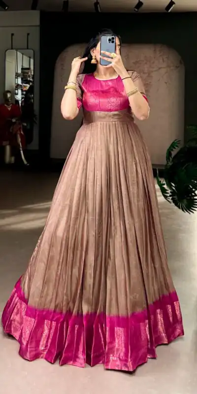 YNF 5012 Brown Mass Mello Gown with Zari Work. Available at βΉ1799 only. Wedding, Party, Festive, Events Delivery 4-6 Working Days. Shop now. | Gowns, Bollywood Gowns, Creative Gowns, Designer Gowns, Embroidered Gowns, Party Wear Gowns