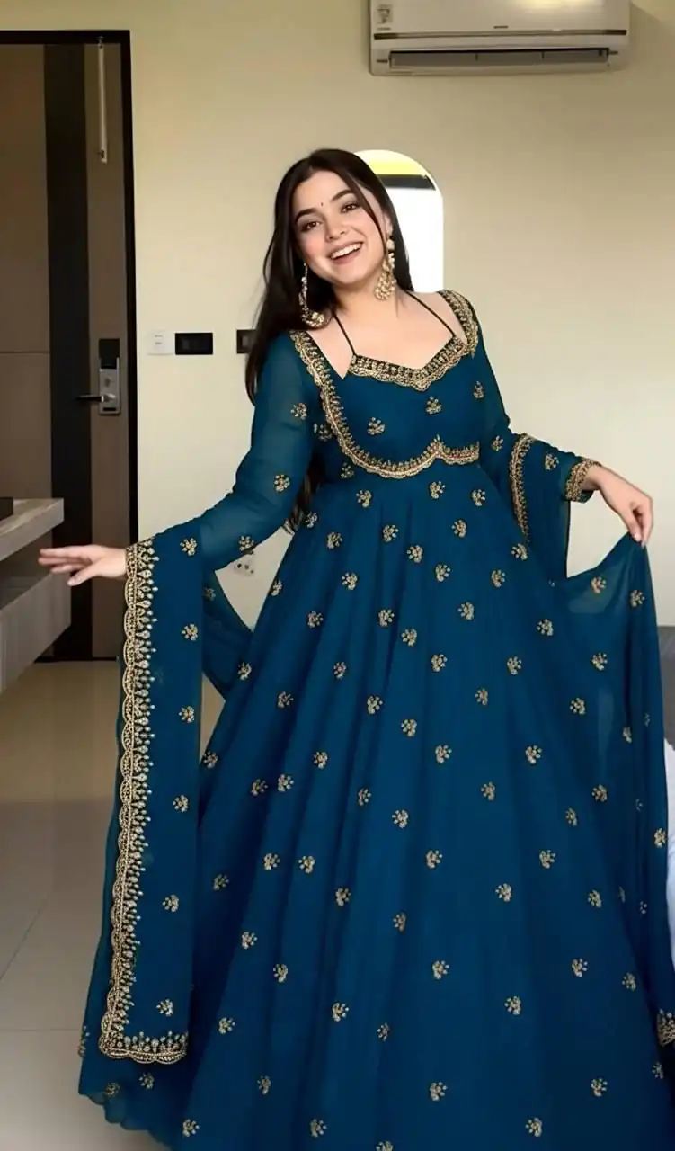 MF 1003 Peacock Blue Georgette Gown. Perfect for Wedding, Party, Pongal, Bridal Wear, Anniversary Price ₹1799. Delivery 4-6 Working Days. Shop now. | Gowns, Bollywood Gowns, Creative Gowns, Designer Gowns, Embroidered Gowns, Party Wear Gowns