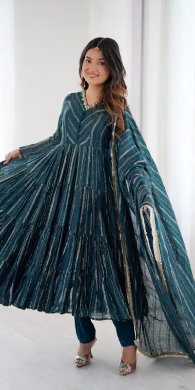 SRK 5305 Peacock Blue Color Mal Chanderi Gown with Mirror Work & Lace Work. Grab it for ₹2399. Delivery 4-6 Working Days. Shop now. | Gowns, Bollywood Gowns, Creative Gowns, Designer Gowns, Embroidered Gowns, Party Wear Gowns