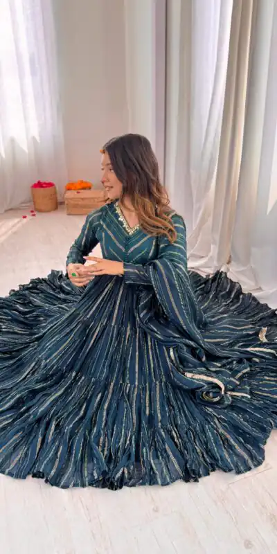 SRK 5305 Peacock Blue Color Mal Chanderi Gown with Mirror Work & Lace Work. Grab it for ₹2399. Delivery 4-6 Working Days. Shop now. | Gowns, Bollywood Gowns, Creative Gowns, Designer Gowns, Embroidered Gowns, Party Wear Gowns