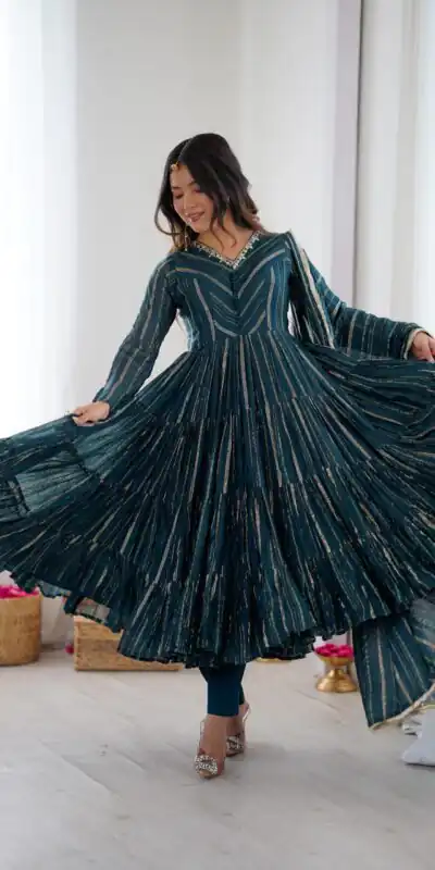 SRK 5305 Peacock Blue Color Mal Chanderi Gown with Mirror Work & Lace Work. Grab it for ₹2399. Delivery 4-6 Working Days. Shop now. | Gowns, Bollywood Gowns, Creative Gowns, Designer Gowns, Embroidered Gowns, Party Wear Gowns