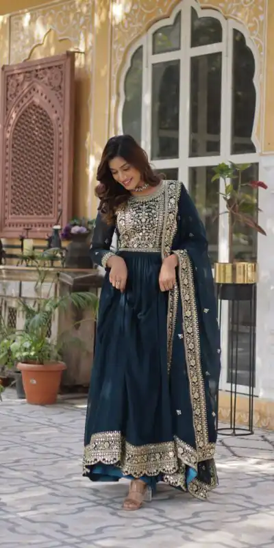 KA 1153 Teal Faux Blooming Gown with Embroidery Work & Zari Work. Available at ₹2599 only. Delivery 4-6 Working Days. Shop now. | Gowns, Bollywood Gowns, Creative Gowns, Designer Gowns, Embroidered Gowns, Party Wear Gowns