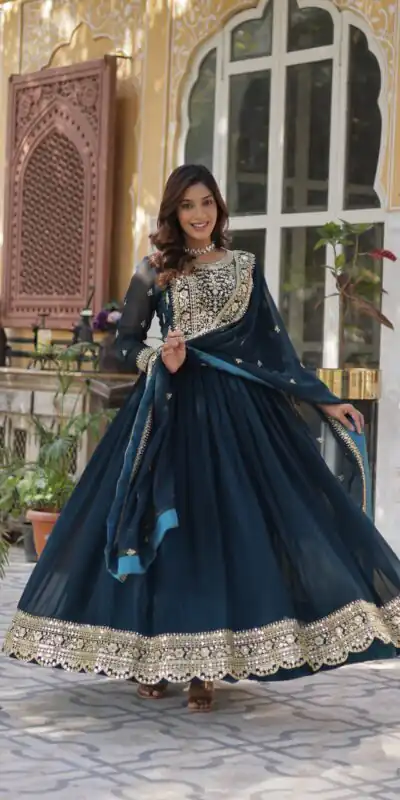 KA 1153 Teal Faux Blooming Gown with Embroidery Work & Zari Work. Available at ₹2599 only. Delivery 4-6 Working Days. Shop now. | Gowns, Bollywood Gowns, Creative Gowns, Designer Gowns, Embroidered Gowns, Party Wear Gowns
