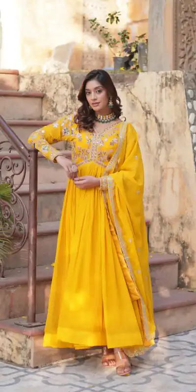 KA 1147 Yellow in Color Faux Blooming Embroidery Work & Zari Work Gown . Grab it for ₹2049. Delivery 4-6 Working Days. Shop now. | Gowns, Bollywood Gowns, Creative Gowns, Designer Gowns, Embroidered Gowns, Party Wear Gowns