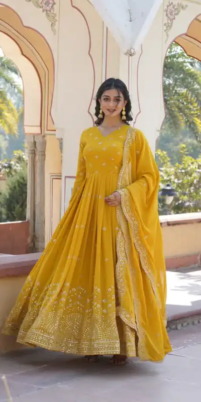 KA 1084 Yellow Faux Georgette Gown Perfect for Wedding, Party, Pooja, Festival Celebrations, Bridal Wear – . Festive Deal ₹2649. Delivery 4-6 Working | Gowns, Bollywood Gowns, Creative Gowns, Designer Gowns, Embroidered Gowns, Party Wear Gowns