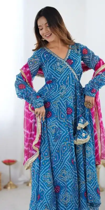 ST 1116 Blue Faux Georgette Gown with Digital Print & Embroidery Work. Exclusive Offer ₹1999. Delivery 4-6 Working Days. Shop now. | Gowns, Bollywood Gowns, Creative Gowns, Designer Gowns, Embroidered Gowns, Party Wear Gowns