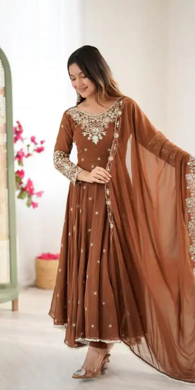 ZF 5012 Brown Blooming Faux Gown with Embroidery Work. Wedding, Party, Festive, Events Grab it for ₹2149. Delivery 4-6 Working Days. Shop now. | Lehenga, Bollywood Lehenga, Creative Lehenga, Designer Lehenga, Embroidered Lehenga, Party Wear Lehenga