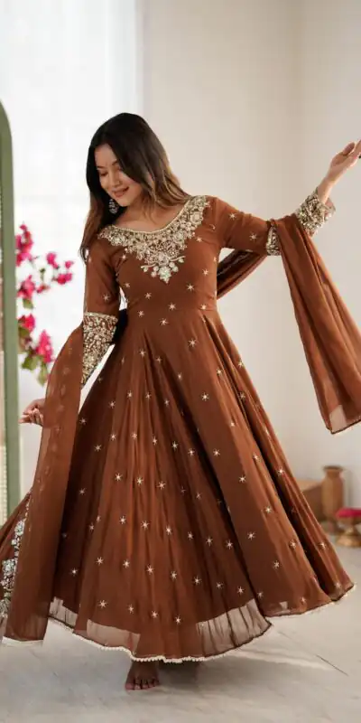 ZF 5012 Brown Blooming Faux Gown with Embroidery Work. Wedding, Party, Festive, Events Grab it for ₹2149. Delivery 4-6 Working Days. Shop now. | Lehenga, Bollywood Lehenga, Creative Lehenga, Designer Lehenga, Embroidered Lehenga, Party Wear Lehenga