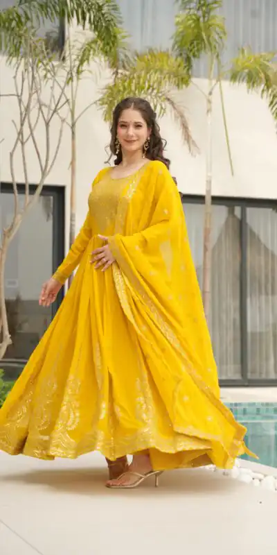 KA 1162 Yellow Faux Blooming Gown with Embroidery Work & Zari Work. Available at ₹2649 only. Delivery 4-6 Working Days. Shop now. | Gowns, Bollywood Gowns, Creative Gowns, Designer Gowns, Embroidered Gowns, Party Wear Gowns
