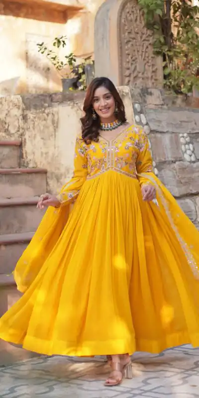 KA 1147 Yellow Faux Blooming Gown with Embroidery Work & Zari Work. Affordable Price ₹2049. Delivery 4-6 Working Days. Shop now. | Gowns, Bollywood Gowns, Creative Gowns, Designer Gowns, Embroidered Gowns, Party Wear Gowns