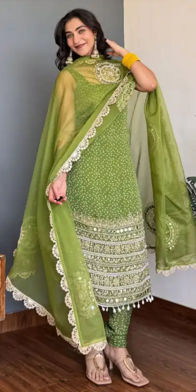 ST 1142 Green Faux Georgette Salwar Suit with Mirror Work & Embroidery Work. Introductory Price ₹2449. Delivery 4-6 Working Days. Shop now. | Jump Suits, Salwar suit, Casual Suits, Creative suits, Designer Suits, Palazzo Suits, Party Wear Suits, Patiala Suits, Straight Suits