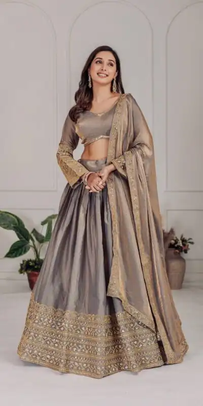 MT 1039 Grey Fendi Chiffon Lehenga Choli with Zari Work & Embroidery Work. Introductory Price βΉ2599. Delivery 4-6 Working Days. Shop now. | Lehenga, Bollywood Lehenga, Creative Lehenga, Designer Lehenga, Embroidered Lehenga, Party Wear Lehenga
