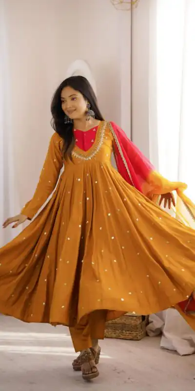 ZF 5023 Mustered Roman Silk Gown with Mirror Work & Embroidery Work. Special Price ₹2099. Delivery 4-6 Working Days. Shop now. | Gowns, Bollywood Gowns, Creative Gowns, Designer Gowns, Embroidered Gowns, Party Wear Gowns
