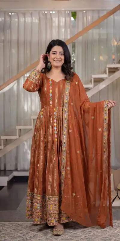 MD 3100 Orange Faux Blooming Gown Perfect for Wedding, Party, Pongal, Raksha Bandhan, Mehendi β. Introductory Price βΉ2549. Delivery 4-6 Working Days | Gowns, Bollywood Gowns, Creative Gowns, Designer Gowns, Embroidered Gowns, Party Wear Gowns