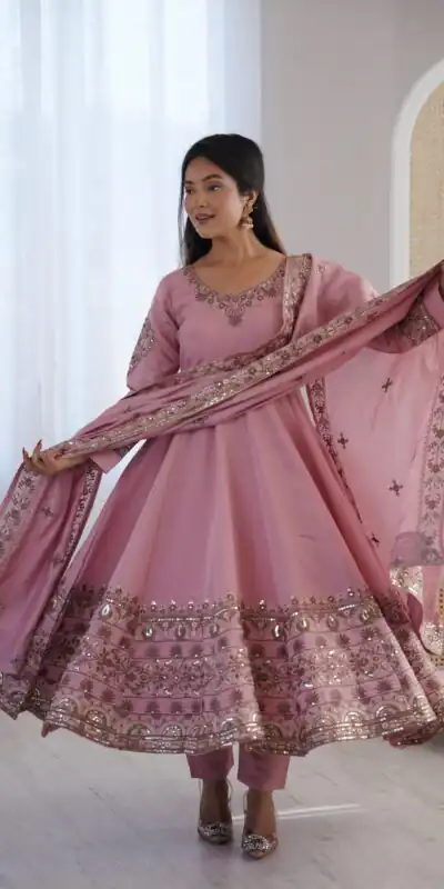 ZF 5016 Dusty Pink Roman Silk Gown with Embroidery Work. Wedding, Party, Festive, Events, Navratri, Offer ₹2499. Delivery 4-6 Working Days. Shop now. | Gowns, Bollywood Gowns, Creative Gowns, Designer Gowns, Embroidered Gowns, Party Wear Gowns