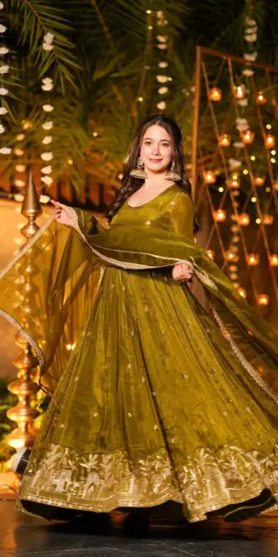 NF 1267 Mehendi Embroidery Work & Sequins Work Salwar Suit in Peach Crunchy Silk. Festive Deal ₹2949. Delivery 4-6 Working Days. Shop now. | Anarkali Suits, Bollywood Anarkali, Creative-Anarkali, Designer Anarkali, Embroidered Anarkali, Party Wear Anarkali