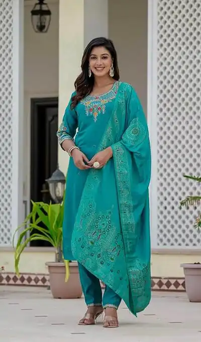 DIVA 121 Firozi Roman Silk Salwar Suit with Sequins Work & Embroidery Work. Available at ₹1899 only. Delivery 4-6 Working Days. Shop now. | Jump Suits, Salwar suit, Casual Suits, Creative suits, Designer Suits, Palazzo Suits, Party Wear Suits, Patiala Suits, Straight Suits