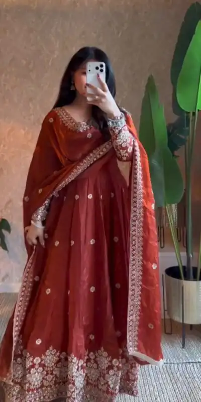 ZB 5080 Rust Fendy Silk Gown with Embroidery Work & Sequins Work. Special Price ₹2399. Delivery 4-6 Working Days. Shop now. | Gowns, Bollywood Gowns, Creative Gowns, Designer Gowns, Embroidered Gowns, Party Wear Gowns